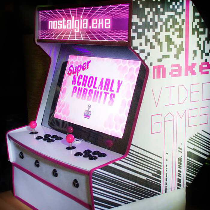 A pink and black DIY arcade cabinet.