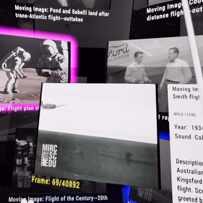 Multiple virtual screens of archival footage from the 20th century.